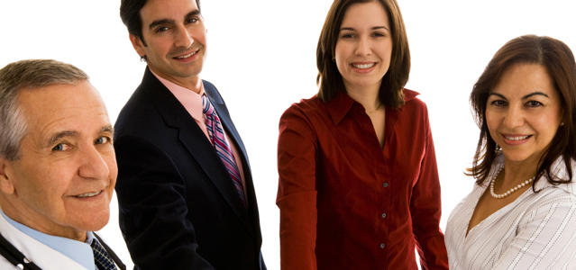 Four people smiling 