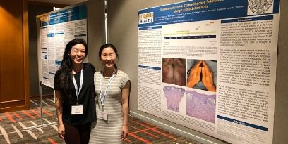 Resident with research poster presentation (c) UC Regents. All rights reserved.