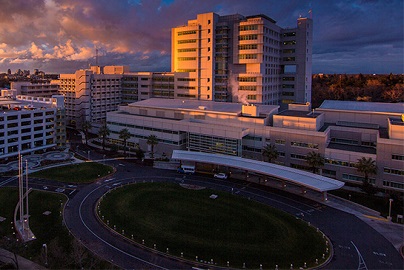 An image of the UC Davis Medical Center at sunset