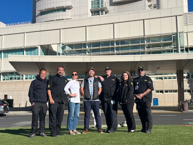 UC Davis’ Head Executive Chef for Food and Nutrition Services Santana Diaz and team stand outside the UC Davis Medical Center.