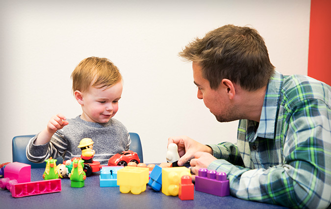 CAARE provider playing with child