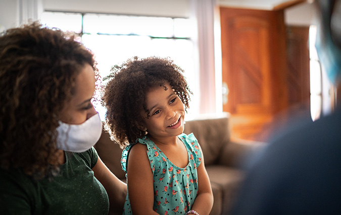 Mom with young daughter in a medical office