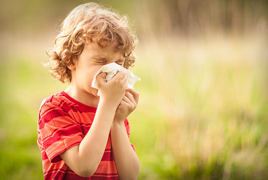 child sneezing
