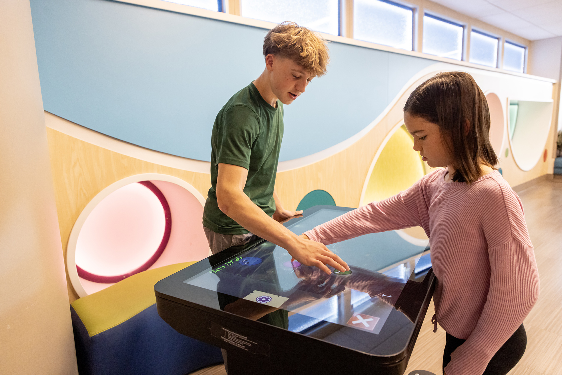 Patients play in Children's Surgery Center waiting room