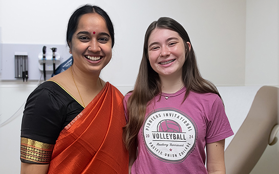 Pediatric neurologist Vaishnavi Vaidyanathan with pediatric neurology patient