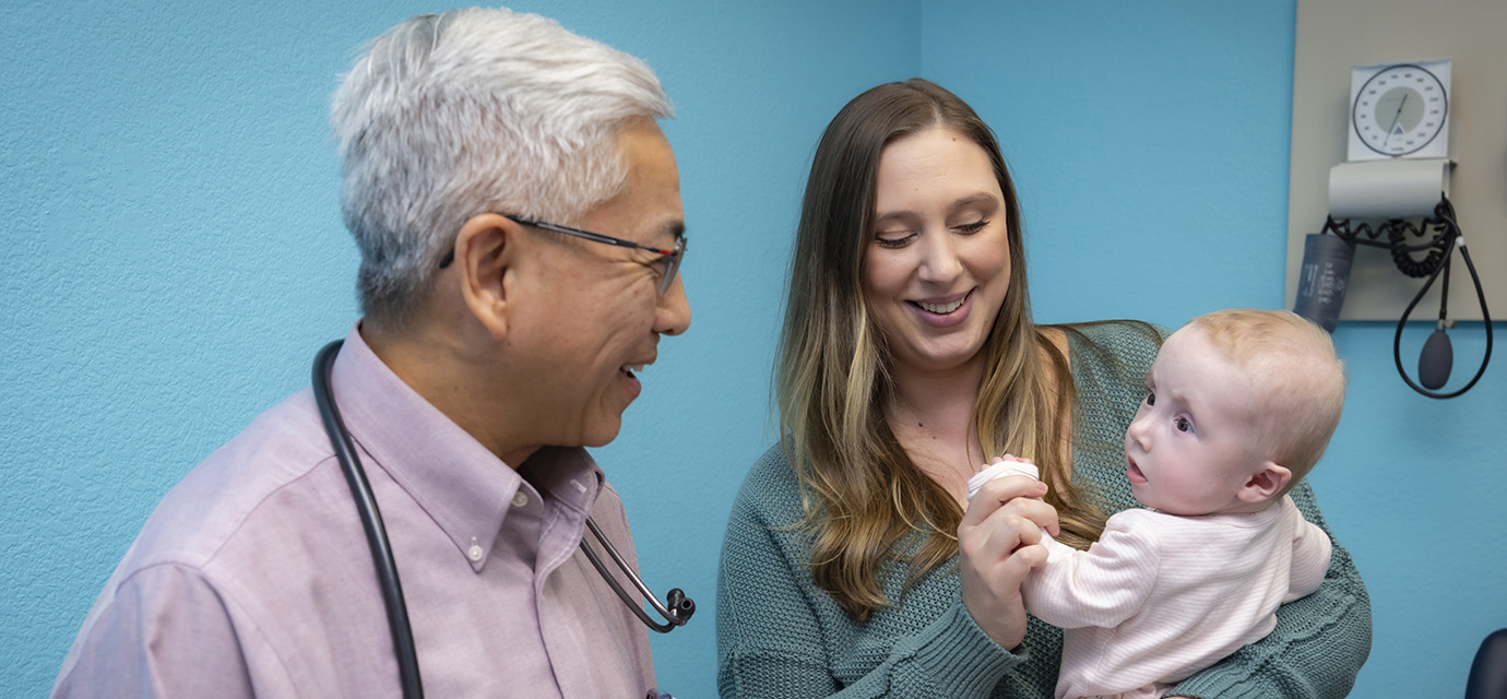 Frank Ing, chief of pediatric cardiology, with Amanda Hodgkin and her daughter Lillian
