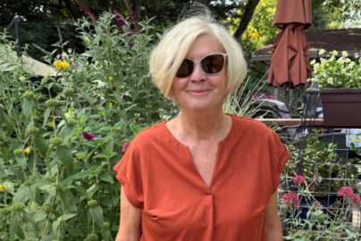 woman in orange shirt