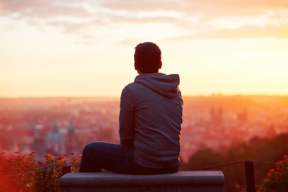 person viewing city sunset