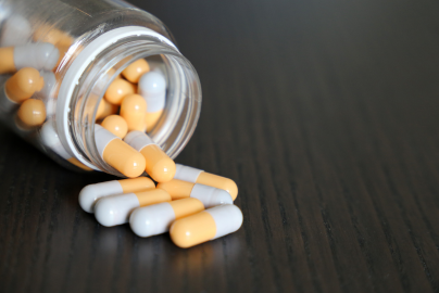 A spilled pill bottle on its side.