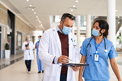 Doctors with masks (C) Adobe stock. All rights reserved.