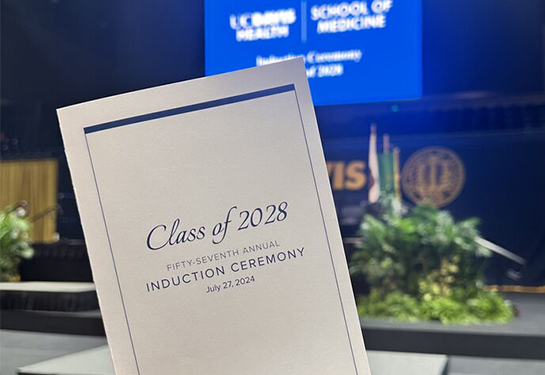 A printed Induction program with the words “Class of 2028” as the headline