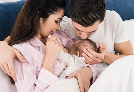 Woman, man and baby