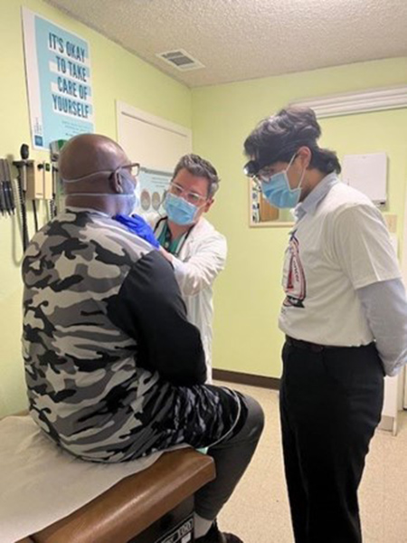 UC Davis medical student and fellow at a head and neck cancer screening.