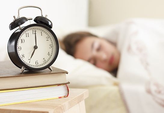 Female teenager sleeping in bedtime change