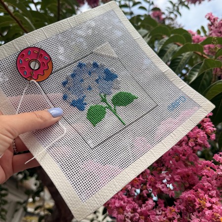 Needle point outline of a flower