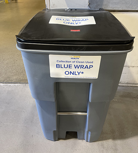 A blue wrap recycling bin in the hospital.