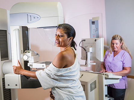 woman getting a mammogram for breast cancer screening