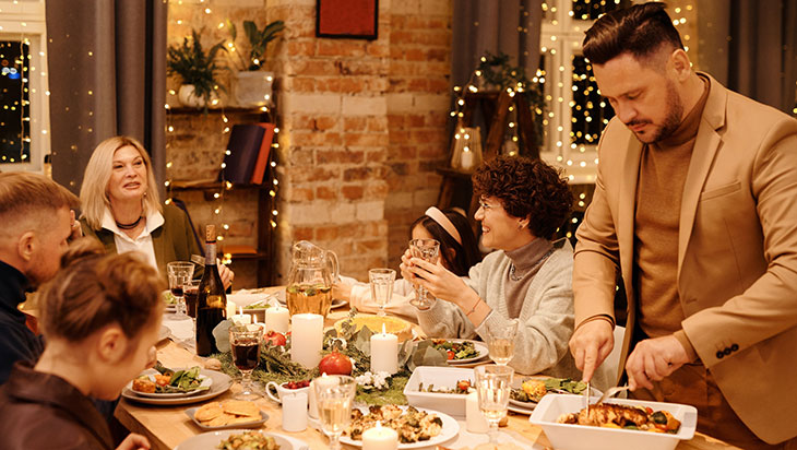 family eating holiday dinner