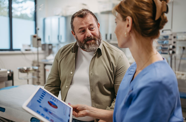 Man talking about GLP-1s for weight loss with health care provider