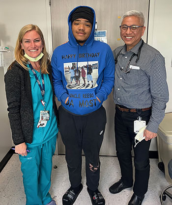 Orlando with Frank Ing, chief of pediatric cardiology, and a nurse practitioner