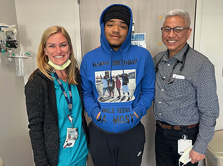 Orlando with Frank Ing, chief of pediatric cardiology, and a nurse practitioner