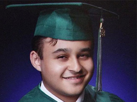 Joshuah in his high school cap and gown