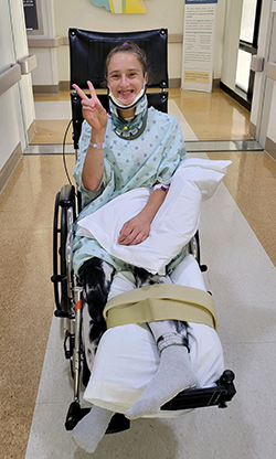 Julia in her wheelchair during recovery