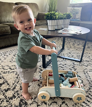 Nixon walking with his push cart