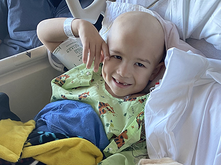 Pediatric cancer patient AJ in the hospital