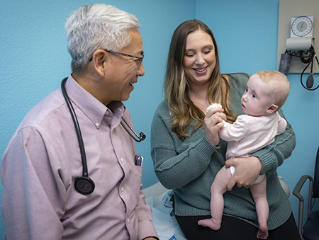 Frank Ing, chief of pediatric cardiology, with Amanda and her daughter Lillian