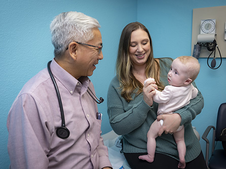 Frank Ing, chief of pediatric cardiology, with Amanda and her daughter Lillian
