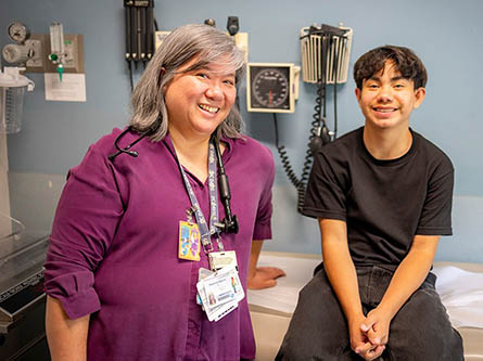 Pediatric nephrology patient Justin with pediatric nephrologist Stephanie Tram-Anh Nguyen