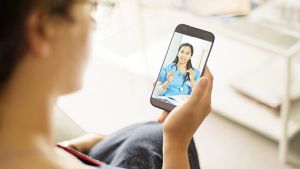 Person watching a video on phone