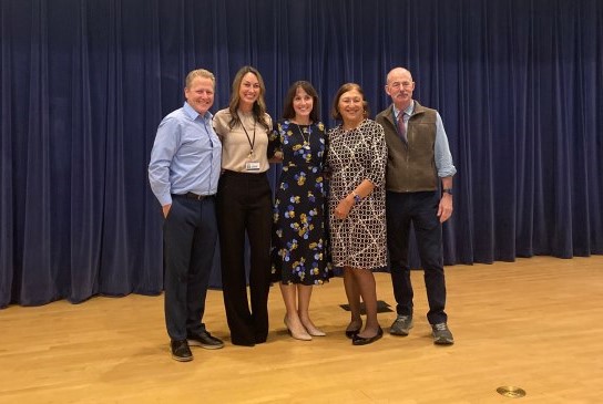 HEAL directors, guest speaker, and coordinator posing after the launch