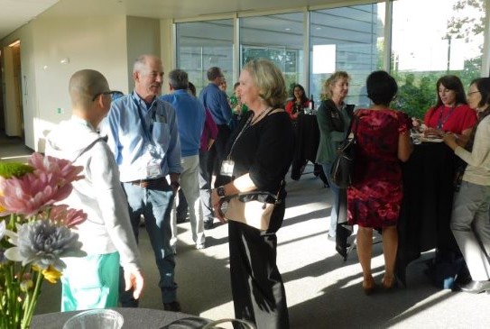 HEAL members networking at an evening event