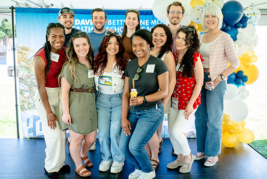 A group shot of school of nursing alumni during a reunion/picnic