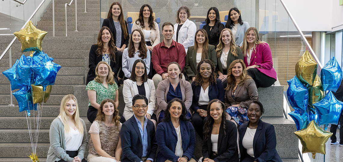 DNP-FNP students sitting on steps at the Betty Irene Moore School of Nursing