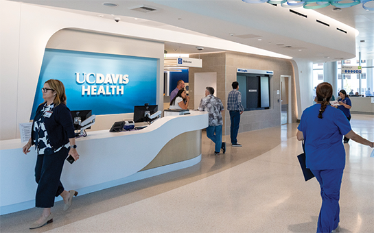 People walking through the 48X Complex outpatient surgery center lobby