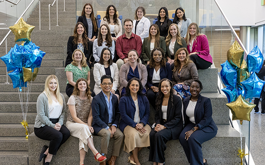 DNP-FNP students sitting on steps at the Betty Irene Moore School of Nursing
