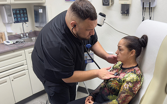 Medical student Frank Sierra and patient