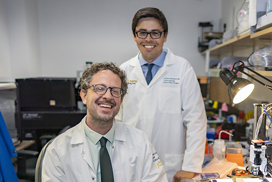 Biomedical engineering professor, Randy Carney and head and neck surgeon, Andrew Birkeland.