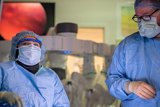 Two surgery team members in the operating room.