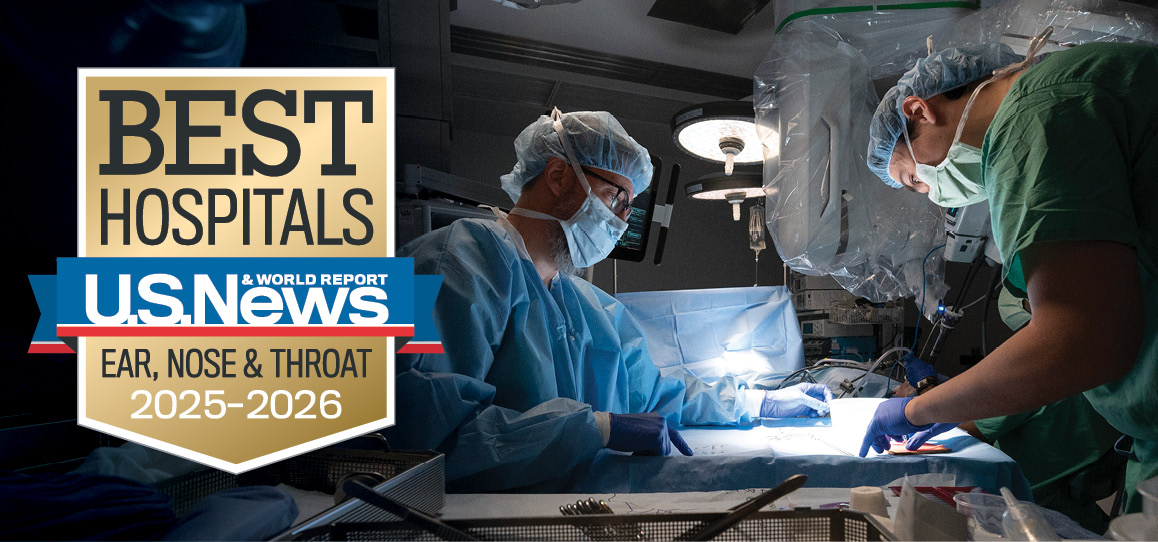 Two head and neck surgeons in the operating room with US News and World Report Best Hospitals Ear, Nose and Throat 2025-2026 badge overlaid.