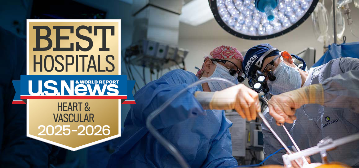 Two surgeons in the operating room with US News and World Report Best Hospitals Heart and Vascular Surgery 2025-2026 badge overlaid.