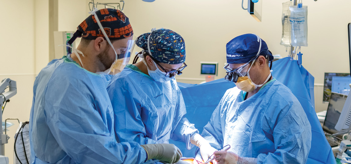 Three UC Davis Health surgeons in the operating room.