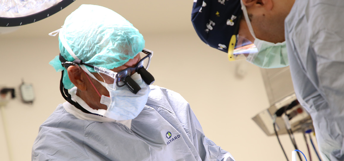 Two orthopedic surgeons in the operating room.