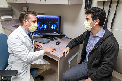 Doctor talking with patient