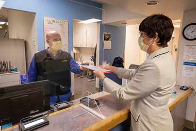 Patient checking in for appointment