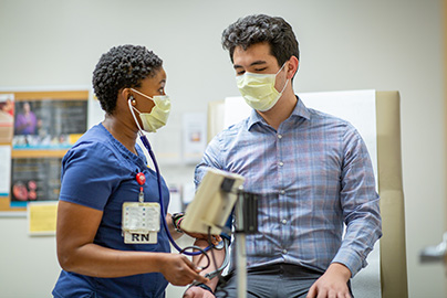 Nurse examining patient