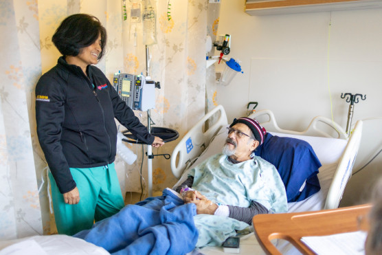Physician and patient speaking
